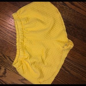 Bright yellow shorts